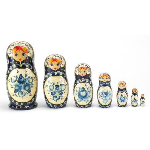 85 - Set of seven Matryoshka Russian stacking dolls, 24cm high