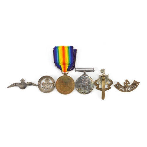 184 - British Military World War I pair with two cap badges, silver services rendered brooch and silver an... 