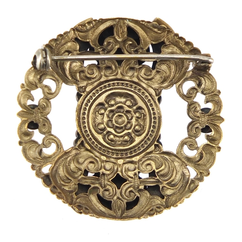 572 - ** DESCRIPTION AMENDED 1/3 **  1930's Egyptian revival brass brooch, 4cm in diameter