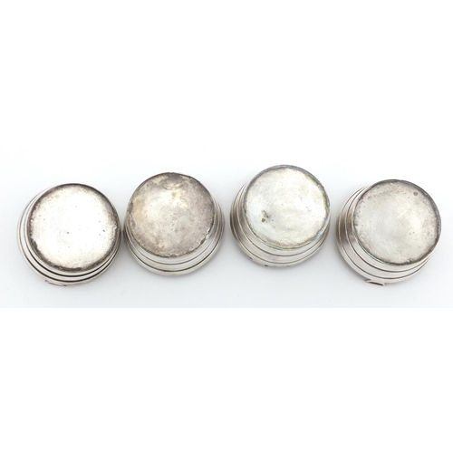 630 - Set of four silver plated barell shaped salts, with shovel spoons, housed in a velvet and silk lined... 