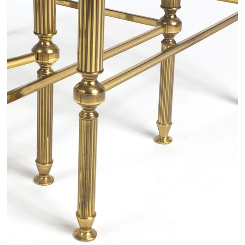 19 - Graduated nest of three brass coffee tables with glass tops, the largest 46cm H x 56cm W x 46cm D