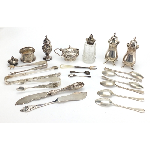612 - Georgian and later silver including a pair of casters, sugar tongs and teaspoons, various hallmarks,... 
