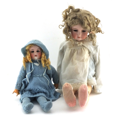 263 - Two German bisque headed dolls with jointed limbs, including one by Armand Marseille numbered 390, t... 
