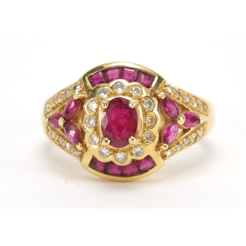 726 - 18ct gold ruby and diamond dress ring, housed in a Charles Fox Bournemouth tooled leather box, size ... 