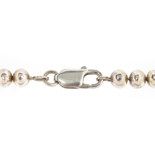 2818 - Silver graduated bead necklace, 38cm in length, approximate weight 51.0g