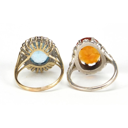 2877 - 9ct gold blue stone and diamond ring and an unmarked silver citrine and marcasite ring, size R, appr... 