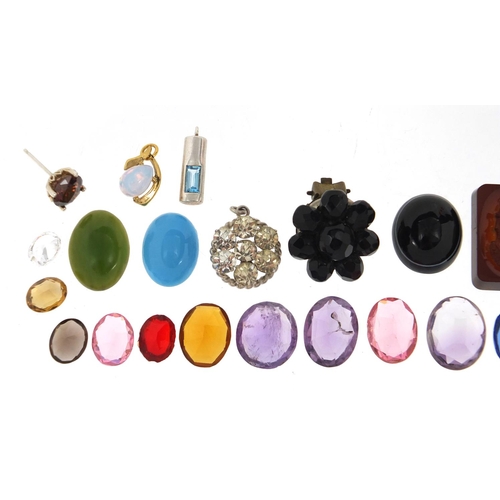 2868 - Loose semi precious stones including an intaglio seal, smoky quartz amethyst and citrine