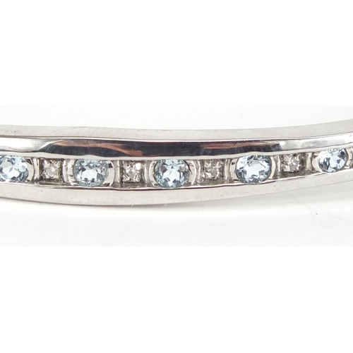 2641 - Silver bangle set with aquamarine and diamonds, approximate weight 12.5g