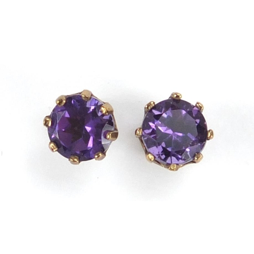 2824 - Pair of 9ct gold amethyst solitaire earrings, approximate weight 1.0g