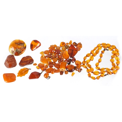 2822 - Amber coloured necklace, loose beads and segments, approximate weight 74.5g