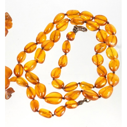 2822 - Amber coloured necklace, loose beads and segments, approximate weight 74.5g