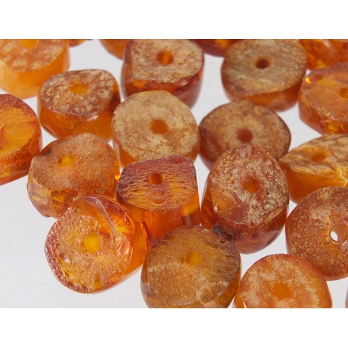 2838 - Loose amber coloured beads, approximate weight 44.0g