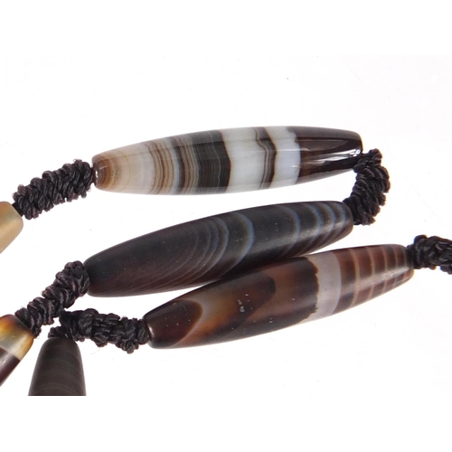 2807 - Islamic agate elongated bead necklace, 60cm in length
