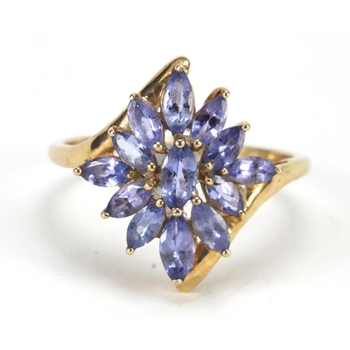 2662 - 9ct gold tanzanite flower head ring, size V, approximate weight 3.1g