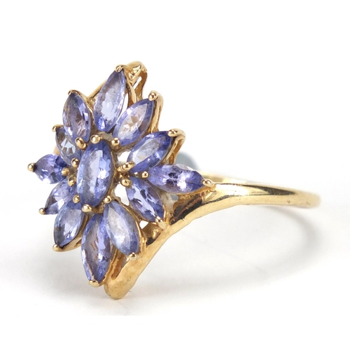 2662 - 9ct gold tanzanite flower head ring, size V, approximate weight 3.1g