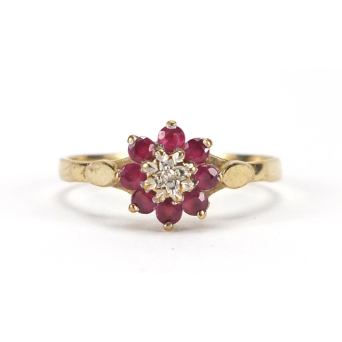 2831 - 9ct gold ruby and diamond flower head ring, size L, approximate weight 1.4g