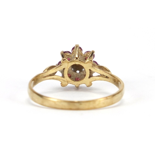 2831 - 9ct gold ruby and diamond flower head ring, size L, approximate weight 1.4g