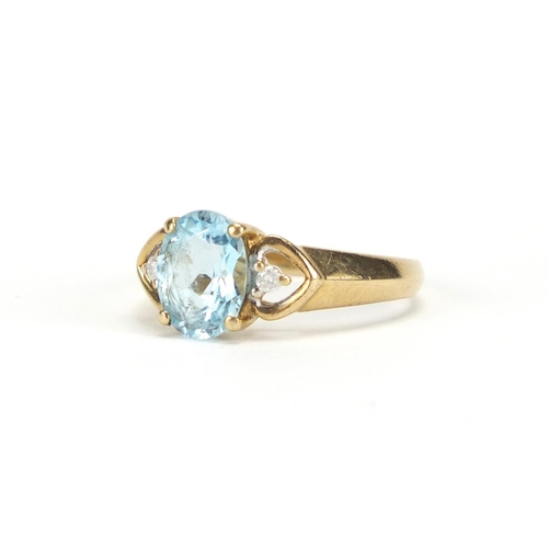 2664 - 9ct gold blue topaz and diamond ring, size N, approximate weight 2.7g