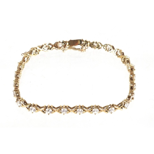 2630 - 9ct gold cubic zirconia bracelet, 20cm in length, approximate weight 6.9g
