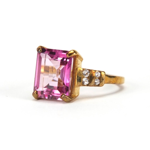 2806 - 9ct gold pink stone ring, set with clear stones to the shoulders, size N, approximate weight  5.0g