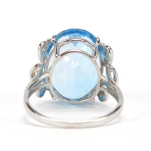 2650 - 9ct white gold blue stone ring set with diamonds to the shoulders, size N, approximate weight 4.8g