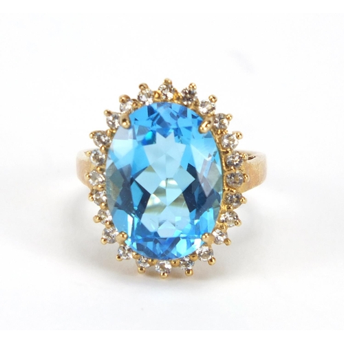 2633 - 9ct gold blue and clear stone ring, size N, approximate weight 6.7g