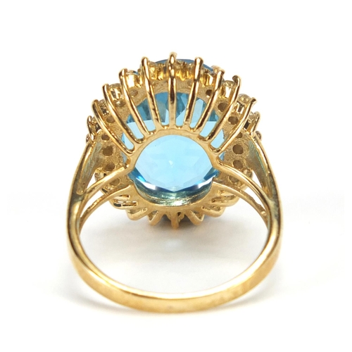 2633 - 9ct gold blue and clear stone ring, size N, approximate weight 6.7g
