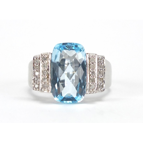 2673 - 14ct white gold blue stone ring set with diamonds to the shoulders, size S, approximate weight 7.9g