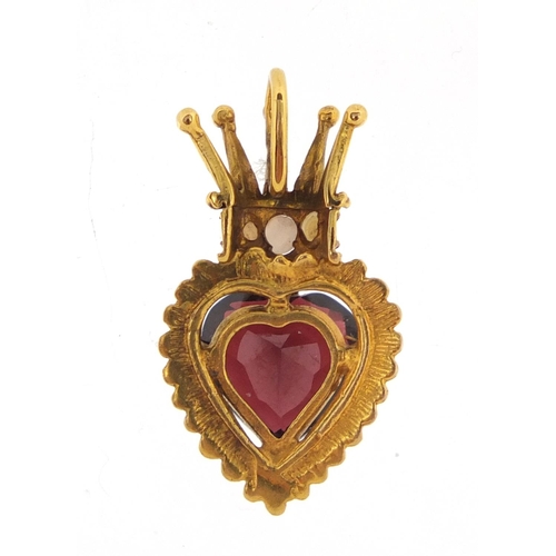 2674 - Unmarked gold garnet and seed pearl crowned love heart pendant, 2.6cm in length, approximate weight ... 