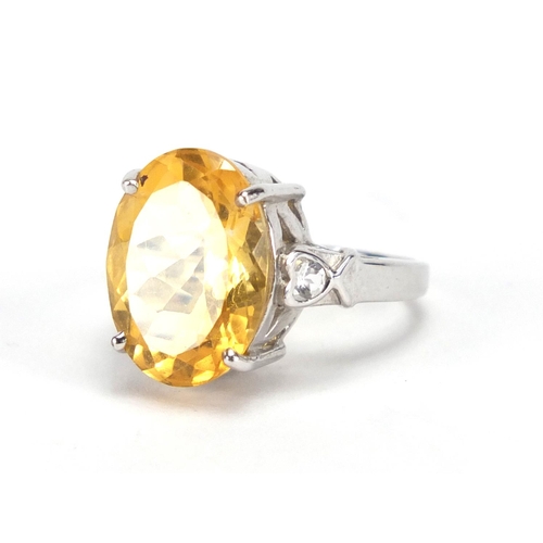2648 - 9ct white gold citrine ring set with clear stones to the shoulders, size N, approximate weight 6.6g