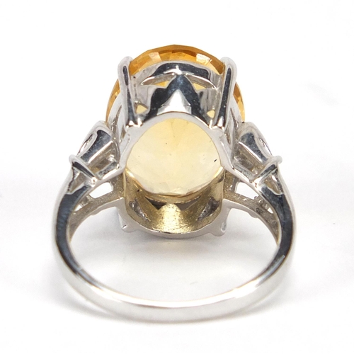 2648 - 9ct white gold citrine ring set with clear stones to the shoulders, size N, approximate weight 6.6g