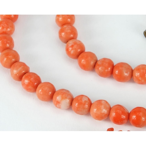 2857 - Four natural and bead coral necklaces, the largest 56cm in length, approximate weight 114.5g