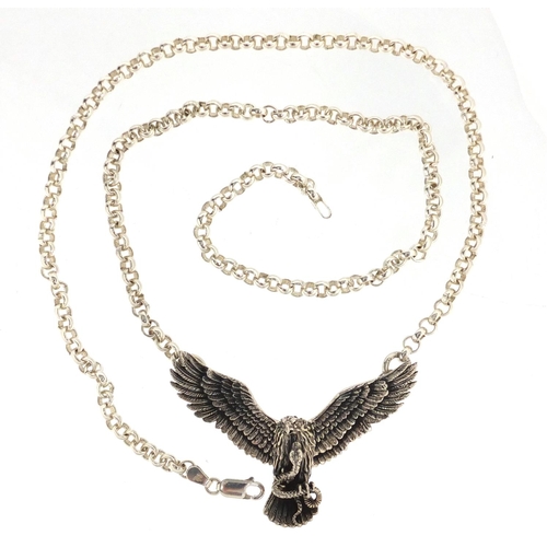 2850 - Silver eagle and serpent necklace with articulated wings, 64cm in length, approximate weight 41.4g