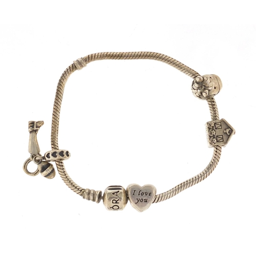 2858 - Silver Pandora bracelet with four charms, with box, 18cm in length, approximate weight 30.8g
