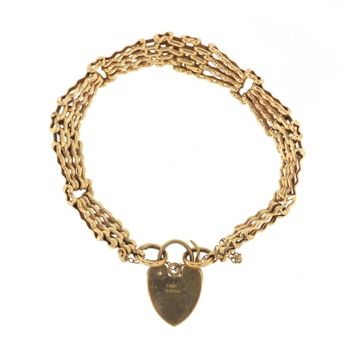 2643 - 9ct gold graduated five row gate bracelet with love heart shaped padlock, approximate weight 19.4g