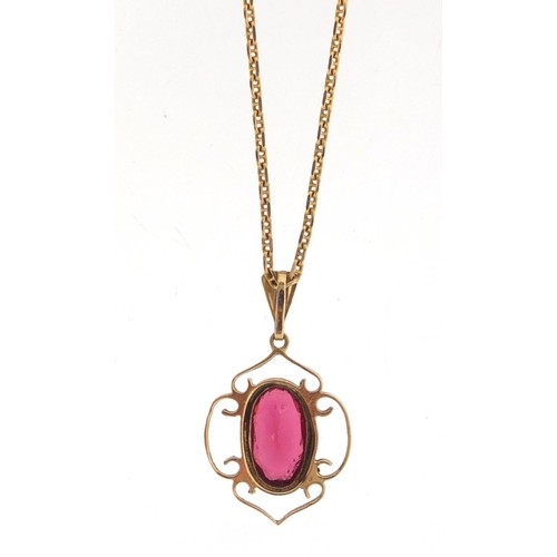 2661 - Unmarked gold pink stone pendant on a 9ct gold necklace, the pendant 2.8cm in length, approximate we... 
