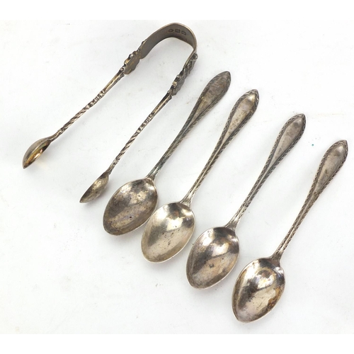 314 - Pair of Georgian silver sugar tongs and four silver teaspoons, approximate weight 81.2g