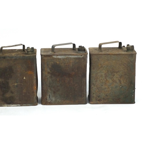 175 - Five vintage fuel cans including Shell, BP and Esso