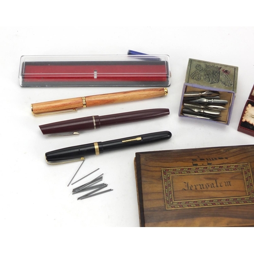 489 - Three vintage fountain pens, one with 14ct gold nib, a silver Yard-O-Led propelling pencil and Jerus... 