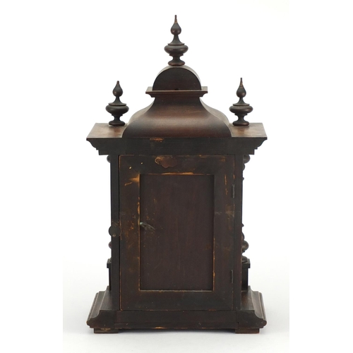 97 - American walnut striking mantel clock, with gilt dial and brass mounts, 48cm high