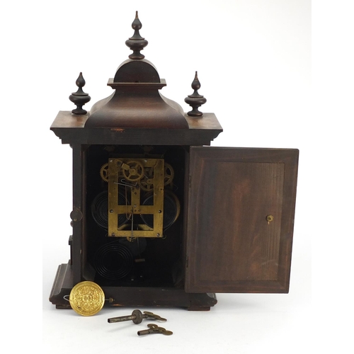 97 - American walnut striking mantel clock, with gilt dial and brass mounts, 48cm high