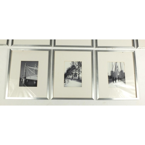 327 - Thirteen contemporary black and white photographs predominantly of London, each mounted and framed, ... 