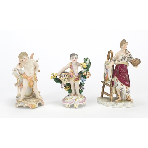84 - Three continental porcelain figures including an artist and cherub, the largest 17.5cm high