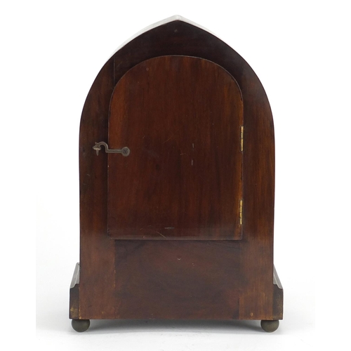 2220 - Inlaid mahogany Gothic arch topped mantel clock by Gilbert, the dial with Arabic numerals, 32cm high