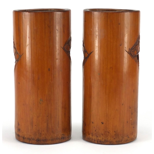 2221 - Pair of Chinese cylindrical bamboo brush pots carved with figures, each 22cm high