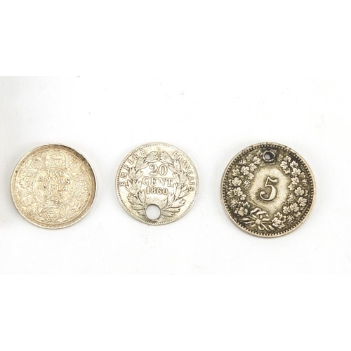 310 - Silver stamp case pendant and three silver coins, Chester hallmarked