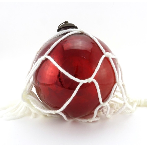 2302 - 19th century red glass witch ball, 23cm high