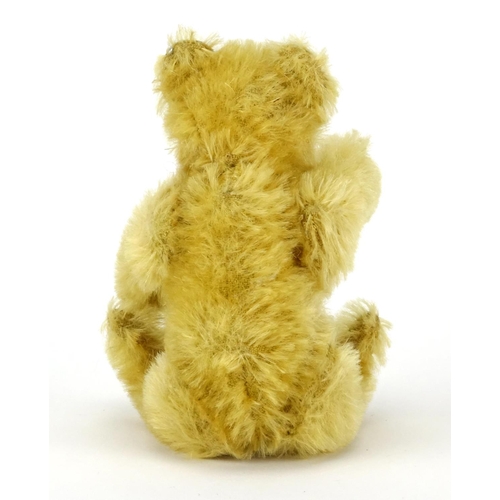 2294 - Miniature golden Steiff teddy bear with articulated limbs, 13.5cm high