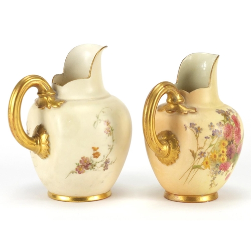 2278 - Two Royal Worcester blush ivory jugs decorated with flowers, both with factory marks and numbered 10... 