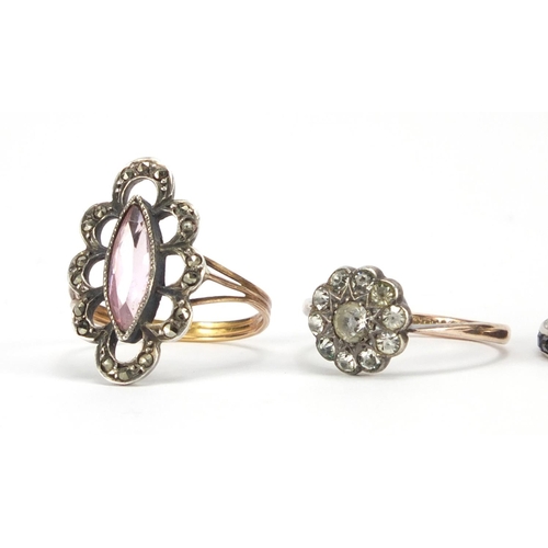 2644 - Four antique rings set with assorted stones including sapphires, garnet and marcasite, various sizes... 
